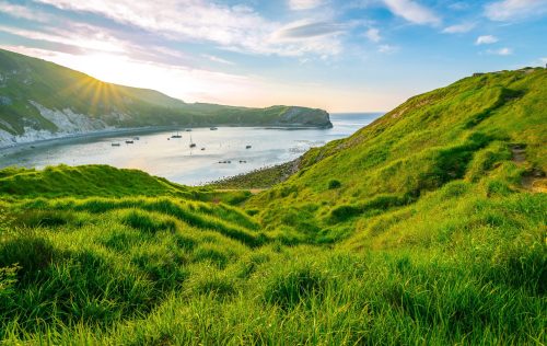 Sea view with boats Lulworth Cove Dorset